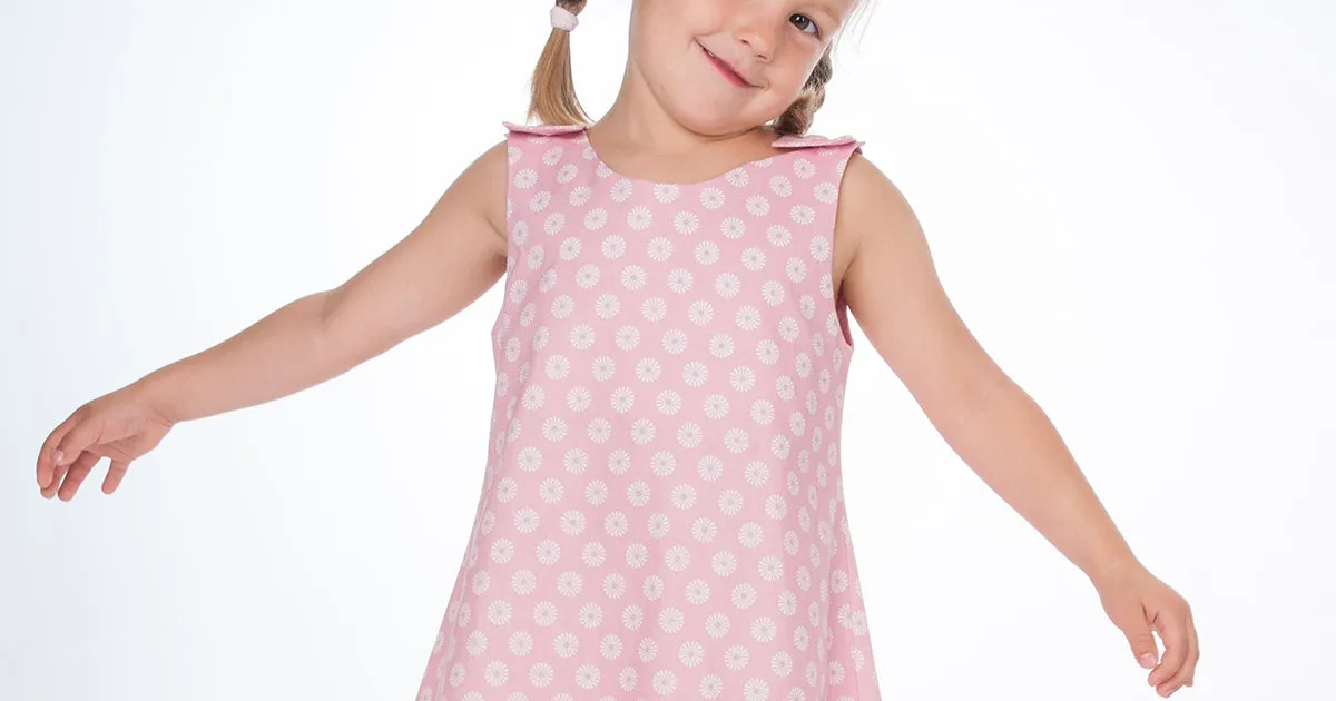 Girls pinafore dress pattern with hem and buttons STEFFI by Patternforkids. Easy girls tunic dress paper sewing pattern for baby and kids