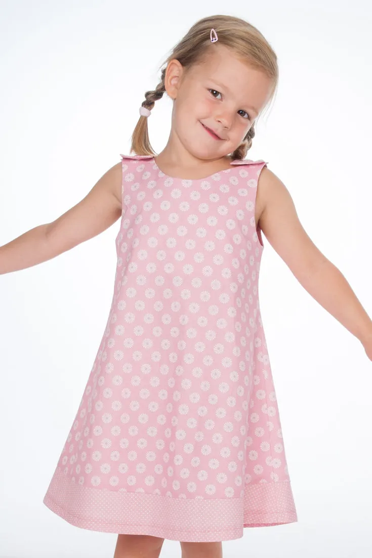 Girls pinafore dress pattern with hem and buttons STEFFI by Patternforkids. Easy girls tunic dress paper sewing pattern for baby and kids